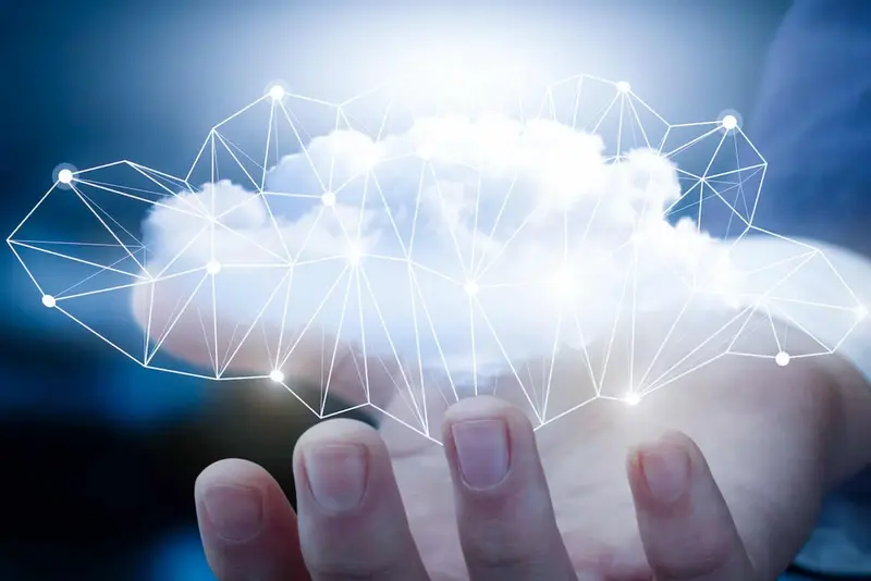 Cloud hosting for secure and scalable digital platforms An open hand holds a digital cloud with interconnected nodes, symbolising secure cloud hosting and interconnected IT infrastructures.
