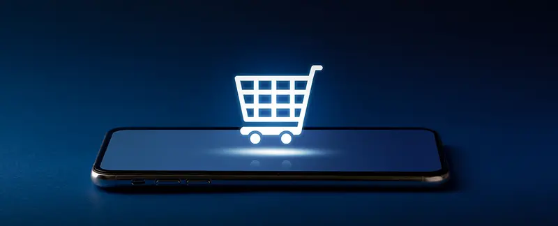 Representation of a shopping cart icon hovering over a smartphone
